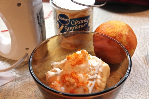 Orange peel added to cream cheese frosting.