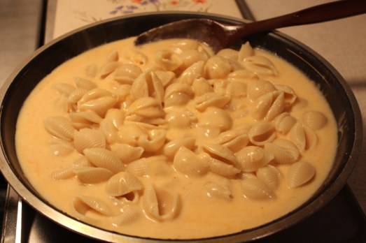 Add the cooked pasta.