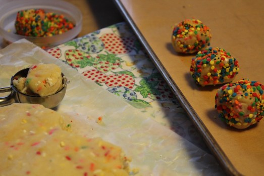 Form balls of dough, roll in more sprinkles, then chill.