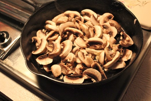 Add mushrooms to skillet.